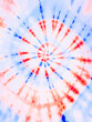 Spiral tie dye pattern. Colorful red and blue tiedye wallpaper backdrop. Americana colors.