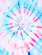 Spiral tie dye pattern. Colorful pink and blue tiedye wallpaper backdrop. 