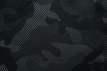 Camouflage pattern. Trendy dark gray camouflage fabric. Military texture. Dark back.