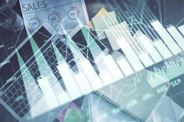 Poster - Financial market graph and top view computer on the desktop background. Multi exposure. Investment concept.