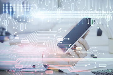 Poster - Double exposure of man's hand holding and using a digital device and data theme hologram drawing. Technology concept.