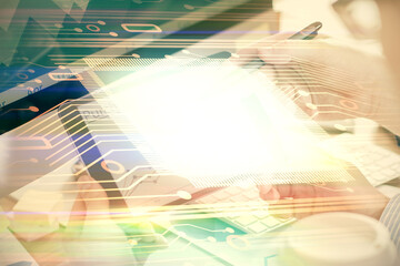 Poster - Multi exposure of man's hands holding and using a digital device and data theme drawing. Innovation concept.