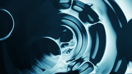 Poster - Colorful abstract liquid spinning with bubbles. Motion. Circles on surface of colorful bright liquid with bubbles. Dense colorful liquid with bubbles on surface