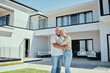 © Delcio F/peopleimages.com - Real estate, couple and happiness of people with a new house property purchase outdoor. Portrait of happy, smile and marriage of a senior man and woman together in retirement smiling with a hug