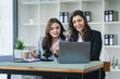 © Daenin - girl working together offer ideas to each other.happy young business colleagues working in the office