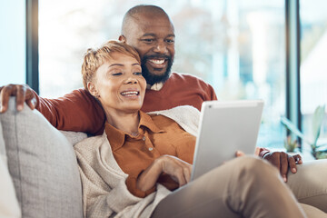 Canvas Print - Senior black couple, tablet on sofa or reading social network, email or communication with smile. Mature black woman, happy black man on mobile technology and social media, relax on web app in home