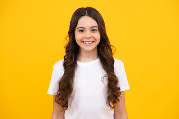 Wall Mural - Happy teenager, positive and smiling emotions of teen girl. Beautiful teen girl student. Portrait of teenager school girl on isolated background. Clever schoolgirl, nerd smart child.