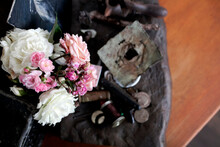 Roses And Vintage Decorations On A Table From Above