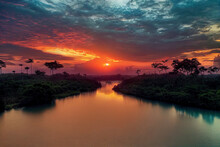 Sunset Over The Amazon River