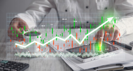 Wall Mural - Human showing graph and stock market statistics. Forex trading analysis