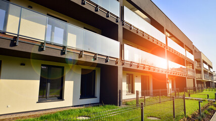 New apartment building on a sunny day. Modern residential architecture. The apartment is waiting for new residents.