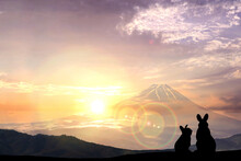 卯年年賀状-兎の親子シルエットと富士山と初日の出