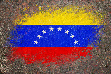 Flag of Venezuela. Flag is painted on a rusty surface. Rusty background