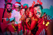© Impact Photography - Friends having fun taking selfies at New Year Eve party