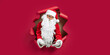 © ZaStock - Santa Claus peeking through hole on red paper while gesturing hands in front of you. New Year advert
