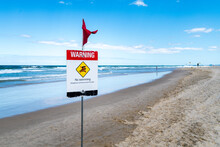 Warning No Swimming Sign On Beach