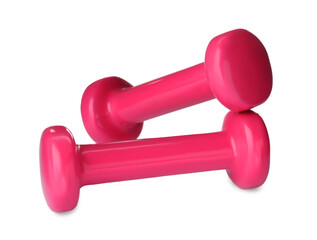 Wall Mural - Pink dumbbells on white background. Weight training equipment