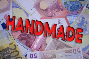 Poster - Handmade word with money. Paper currency background with different banknotes.