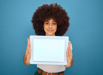 Poster - Mockup, screen and black woman with tablet on blue background in studio for advertising. Marketing, design and woman holding digital gadget with blank, white and empty space for advert, app and text