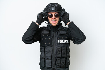 Wall Mural - SWAT man over isolated white background with glasses and surprised