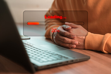 Poster - Man using laptop for download software and waiting to loading digital business data form website, concept of waiting for load of loading bar.