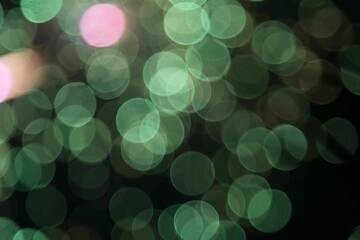 Sticker - Abstract background of green bokeh lights