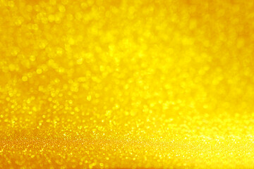 Wall Mural - Shiny golden bokeh glitter lights abstract background