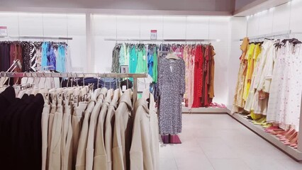 Wall Mural - Fashion, retail and shopping, assortment of apparel products and accessories in clothing store in luxury shopping mall. High quality 4k footage