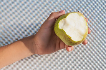 Wall Mural - Image of a pear on a metal background