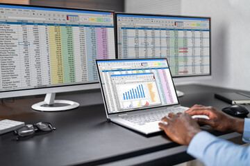 Poster - Man Using Finance Spreadsheet Report
