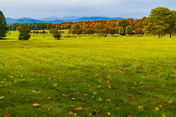 Wall Mural - Vermont farm meadows and fields in Autumn with New York Adirondack Mountains in the distance 
