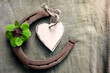 Decoration with four leaf clover and horseshoe place for text
