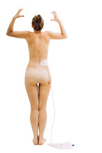 A Tense Young Woman With Twisted Fingers, A Girl After Kidney Surgery With Nephrostome With A Urinal Bag On A White Background. Without Clothes In Beige Underpants