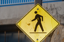 Pedestrian Crossing Sign On The Street