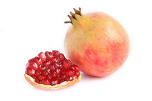 Red Ripe Pomegranate Fruits And Open Pomegranate On White Background. 