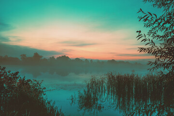 Poster - Magic sunrise over the lake. Misty early morning. Serenity lake