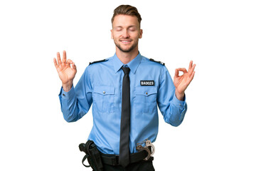 Wall Mural - Young police man over isolated background in zen pose