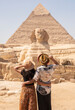 At Sphinx and Pyramids of Giza