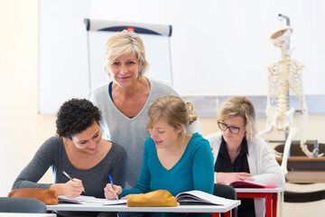 science class with a teacher and three female students