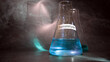 Focus of formaldehyde 37% CH2O chemical compound in glass flask inside a chemistry laboratory with copy space