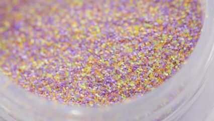 Poster - decorative sequins in a jar rotate in a circle