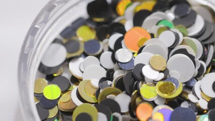 Poster - decorative sequins in a jar rotate in a circle