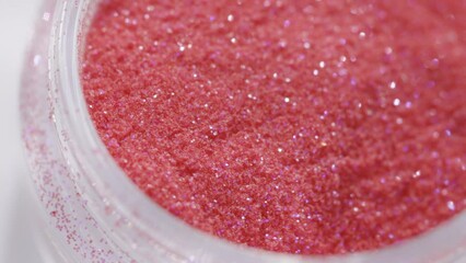 Poster - red sequins in a jar rotate in a circle