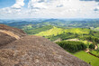 © wtondossantos - View of Pedra Bela(beautiful stone) climbing site and mega zip line, with the catholic shrine on top, located in the city of Pedra Bela, state of São Paulo, Brazil
