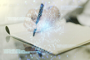 Poster - Double exposure of creative code skull hologram and man hand writing in notebook on background. Malware and cyber crime concept
