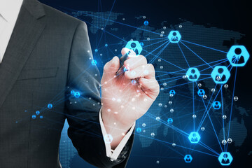 Poster - Global network and social communication concept with man hand using stylus on digital touch screen with glowing user icons on world map background
