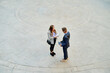 © Cavan Images - Overhead shot of a networking event