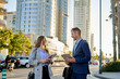 © Cavan Images - Business man and woman coworkers