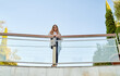© Cavan Images - caucasian businesswoman standing in a modern open space
