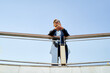 © Cavan Images - caucasian businessman standing in a modern open space